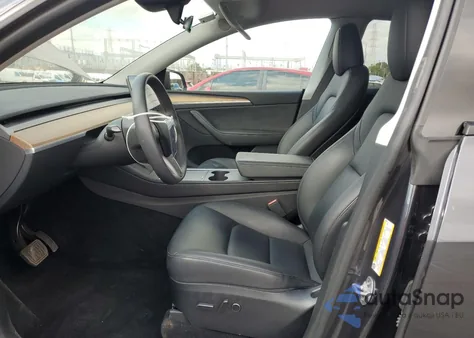 2024 Tesla Model Y из США, поврежденный, VIN 7SAYGDEE0RA231036